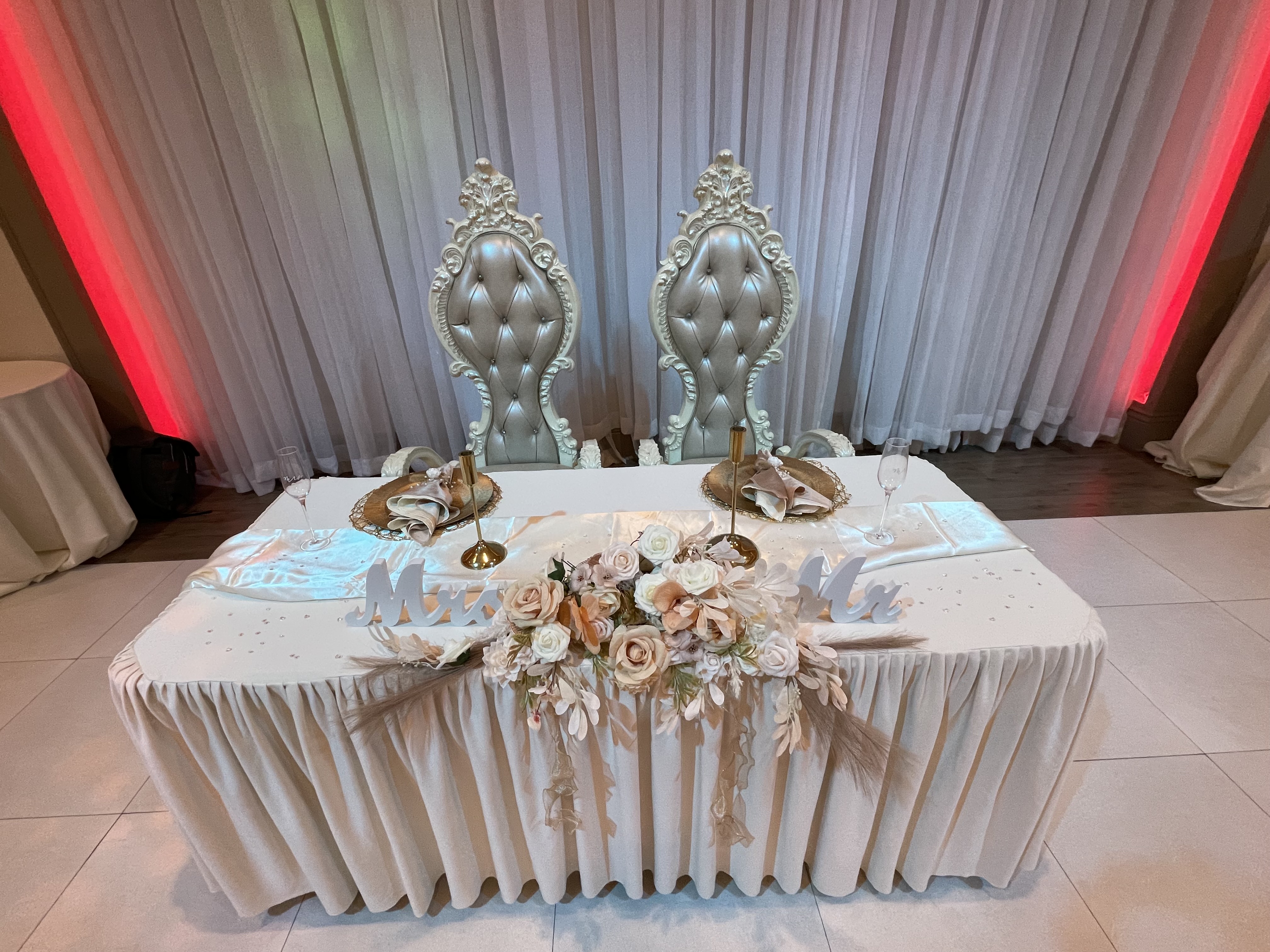 Wedding sweetheart table with floral arrangement