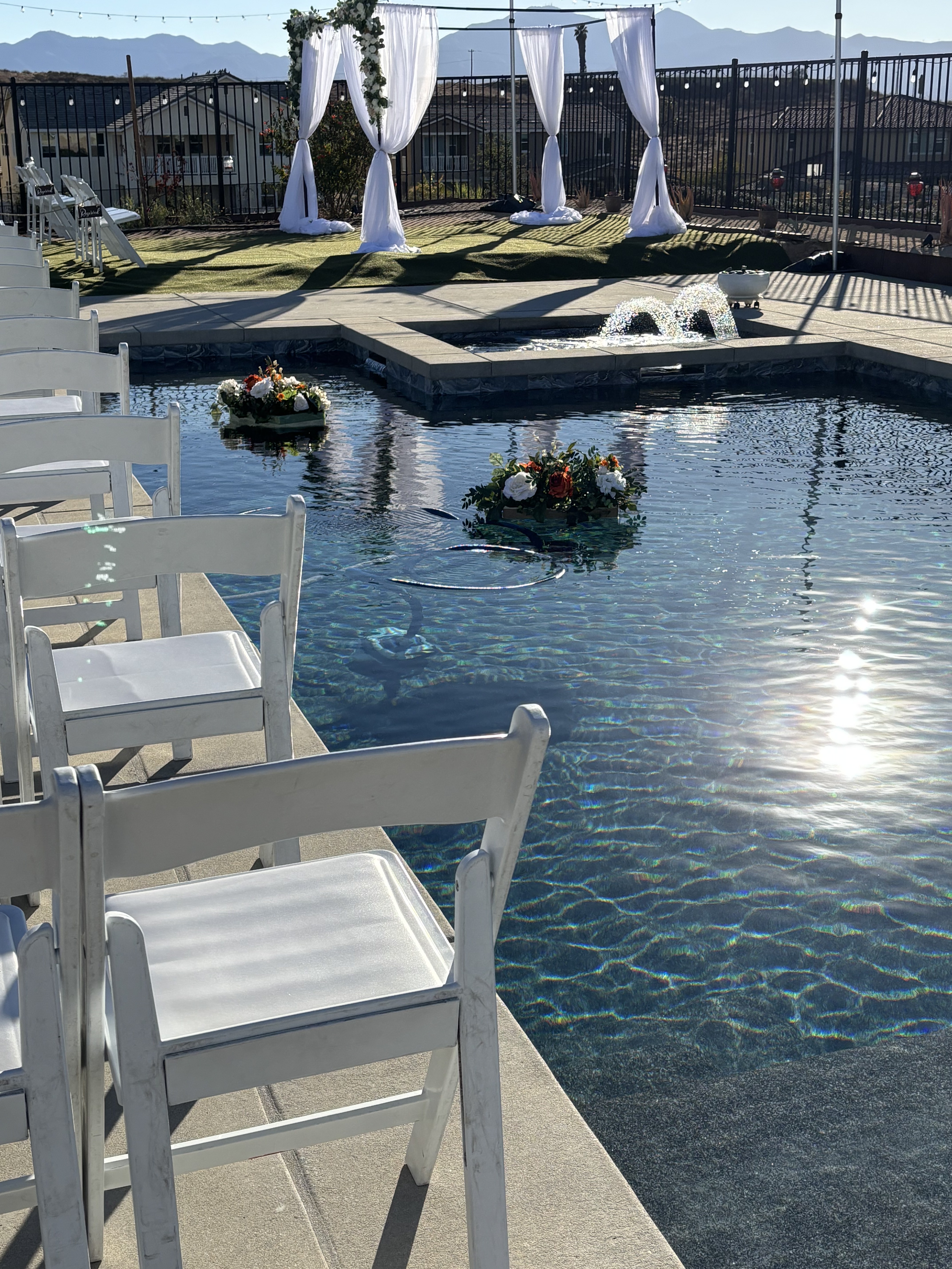 Poolside wedding ceremony setting